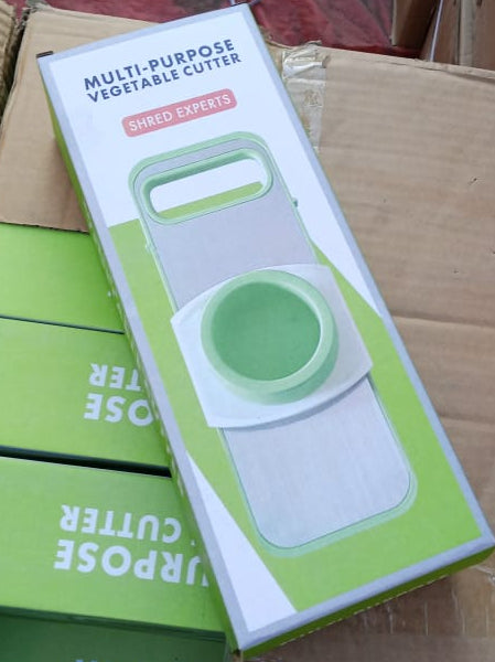 Multifunctional Vegetable Cutter & Grater – Slicer, Shredder, Peeler Tool